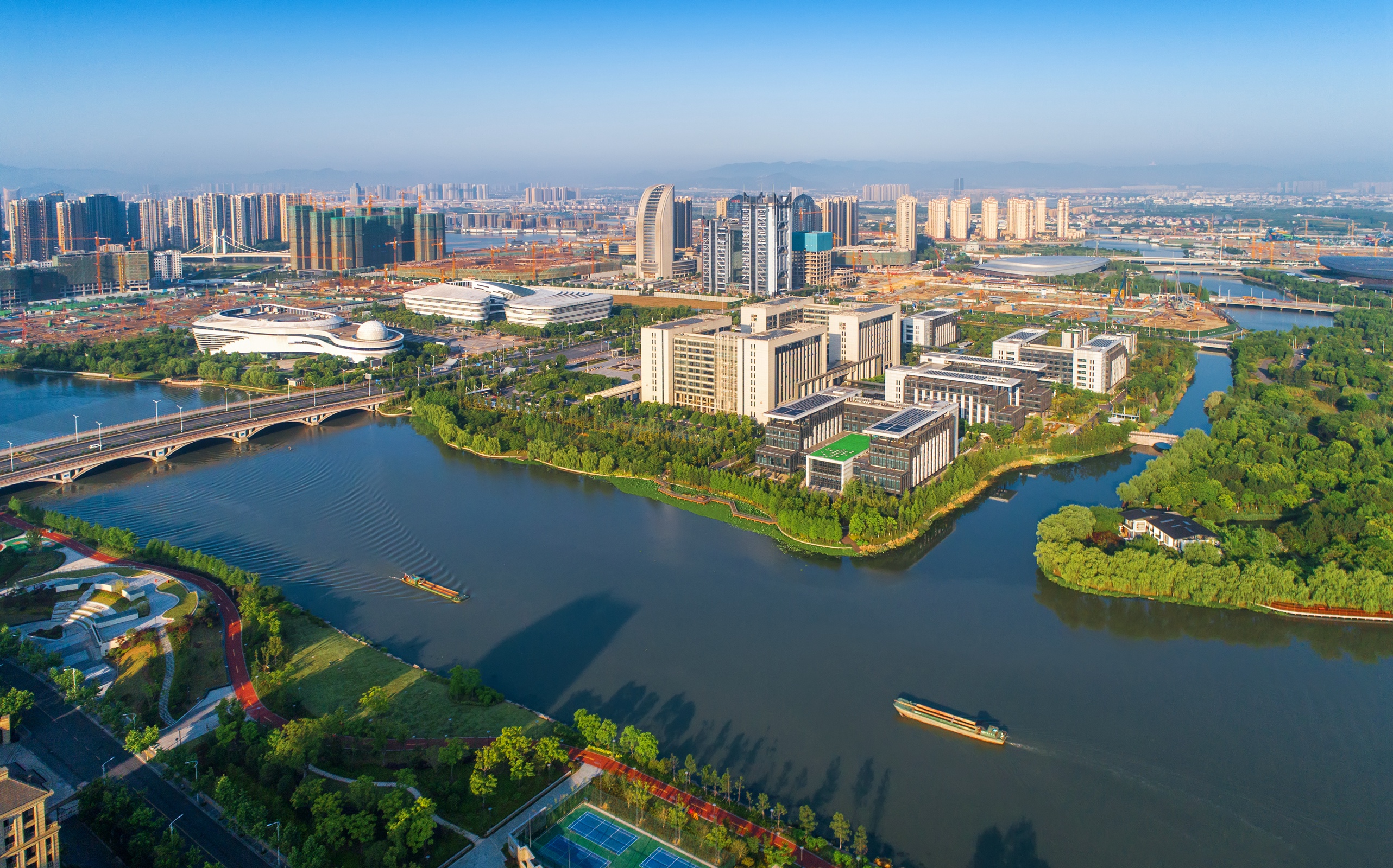 共富同行丨杭州都市圈共同富裕先行示范创新样本评选活动走进镜湖新区